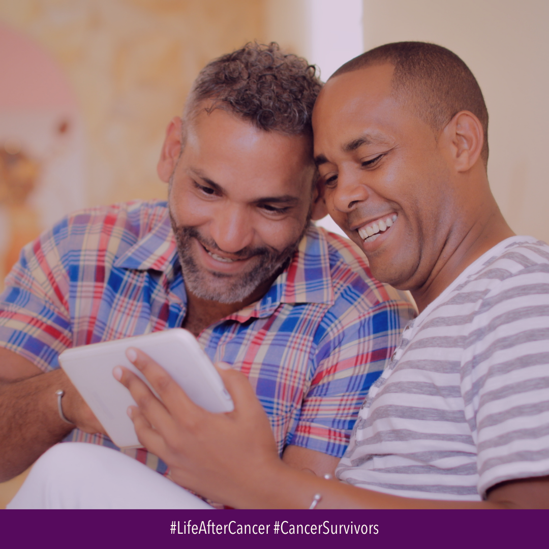 Image of gay couple reading information together on a phone